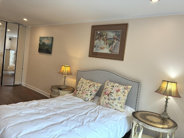 1103 S Hunt Club Dr Unit 125, Mount Prospect, IL 60056 - bedroom featuring wood finished floors and recessed lighting