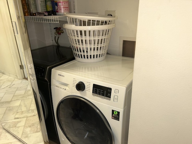 1103 S Hunt Club Dr Unit 125, Mount Prospect, IL 60056 - laundry area featuring washer / dryer