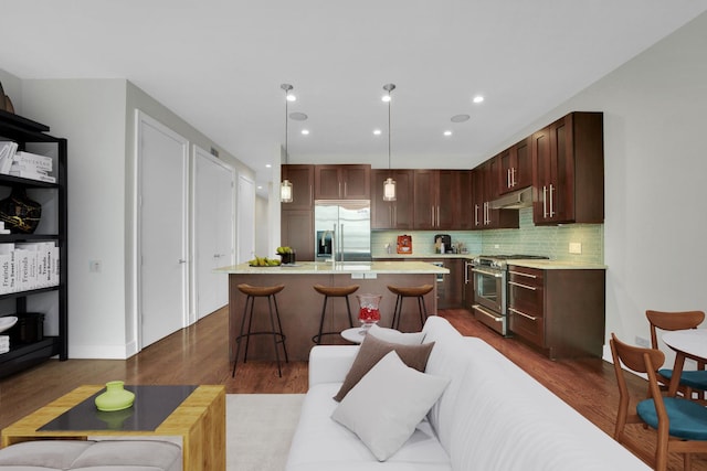 3321 N Sheffield Ave Unit 4, Chicago, IL 60657 - living room featuring dark wood-type flooring and recessed lighting
