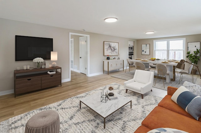 9934 Herrick Ave, Franklin Park, IL 60131 - living area with wood finished floors and baseboards