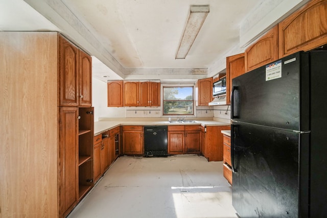 1025 S Ardmore Ave, Villa Park, IL 60181 - kitchen with black appliances, brown cabinetry, light countertops, open shelves, and concrete flooring