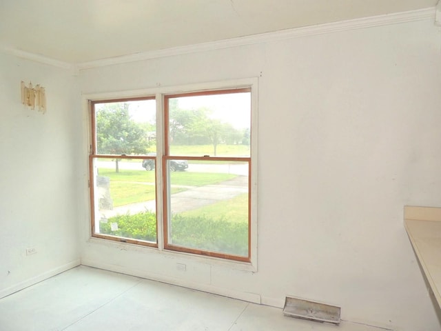 1025 S Ardmore Ave, Villa Park, IL 60181 - unfurnished room featuring crown molding and concrete floors