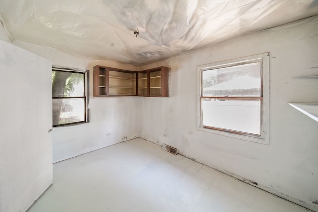 1025 S Ardmore Ave, Villa Park, IL 60181 - empty room featuring finished concrete flooring