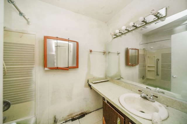 1025 S Ardmore Ave, Villa Park, IL 60181 - bathroom featuring tub / shower combination, vanity, and tile patterned floors