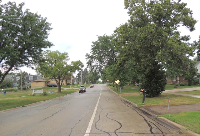 1025 S Ardmore Ave, Villa Park, IL 60181 - view of asphalt street featuring curbs and traffic signs
