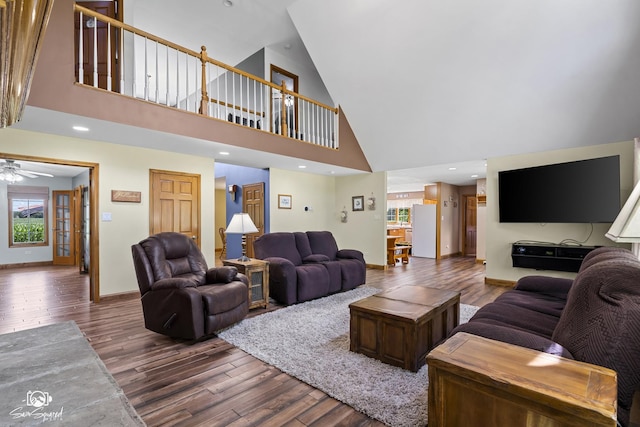 131 E Main St, Essex, IL 60935 - living area with high vaulted ceiling, wood finished floors, healthy amount of natural light, and a ceiling fan