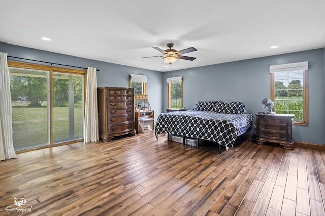 131 E Main St, Essex, IL 60935 - bedroom with multiple windows, wood finished floors, recessed lighting, and a ceiling fan