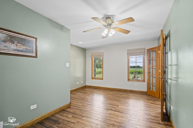 131 E Main St, Essex, IL 60935 - unfurnished room with wood finished floors, french doors, ceiling fan, and recessed lighting