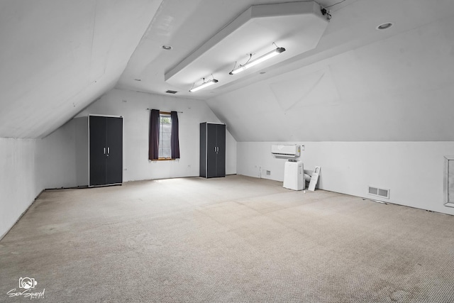 131 E Main St, Essex, IL 60935 - additional living space featuring vaulted ceiling and light colored carpet