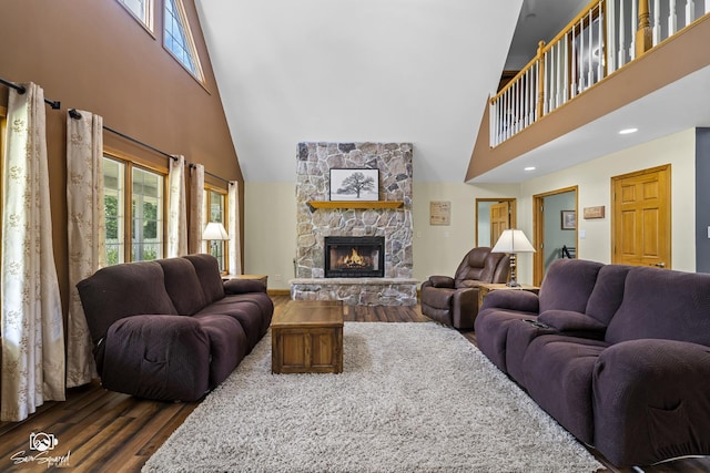 131 E Main St, Essex, IL 60935 - living area with a towering ceiling, dark wood finished floors, and a stone fireplace