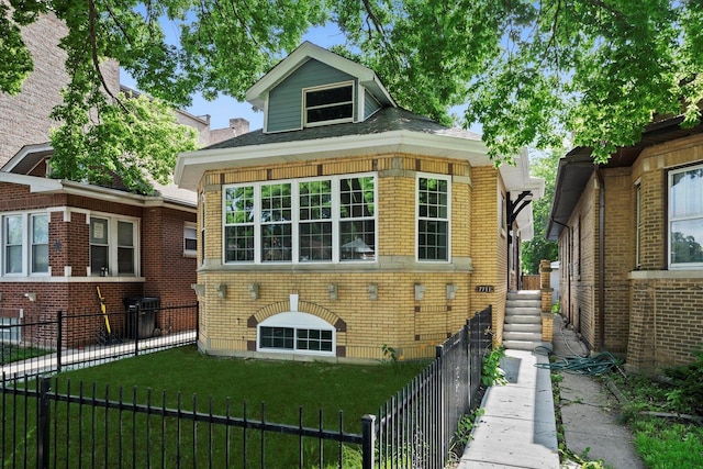 7711 S Honore St, Chicago, IL 60620 - view of front of property with a fenced backyard and brick siding
