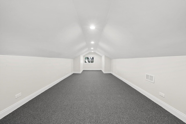 7711 S Honore St, Chicago, IL 60620 - bonus room with lofted ceiling, recessed lighting, and dark carpet