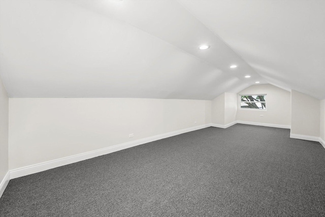 7711 S Honore St, Chicago, IL 60620 - bonus room with vaulted ceiling, dark colored carpet, and recessed lighting