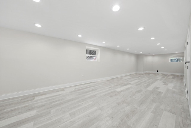 7711 S Honore St, Chicago, IL 60620 - basement with recessed lighting, light wood-style flooring, and plenty of natural light