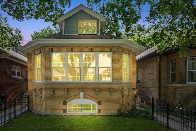 7711 S Honore St, Chicago, IL 60620 - rear view of property with a fenced backyard