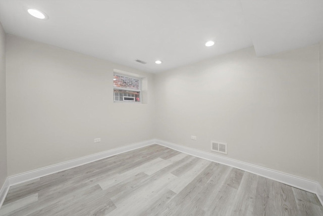 7711 S Honore St, Chicago, IL 60620 - spare room with light wood-style flooring and recessed lighting