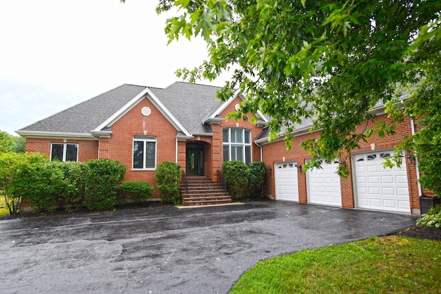 26159 N Hill Ave, Wauconda, IL 60084 - traditional-style house featuring asphalt driveway, brick siding, and roof with shingles