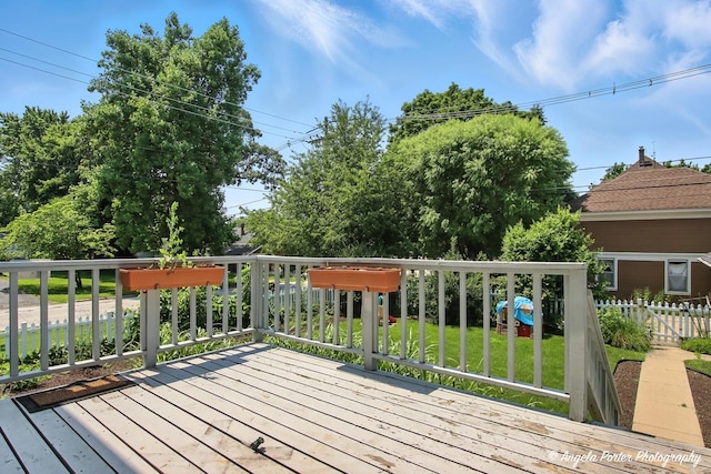 1100 N Hart St, Harvard, IL 60033 - wooden deck with a fenced backyard