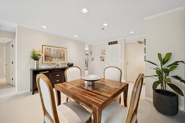 451 Town Place Cir Unit 308, Buffalo Grove, IL 60089 - dining space featuring light colored carpet, recessed lighting, and crown molding