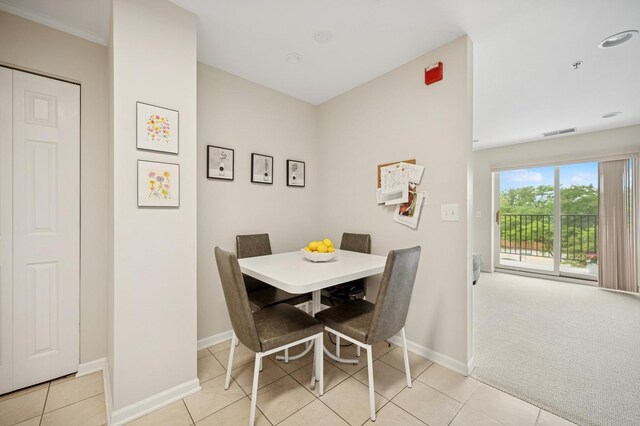 451 Town Place Cir Unit 308, Buffalo Grove, IL 60089 - tiled dining space with baseboards