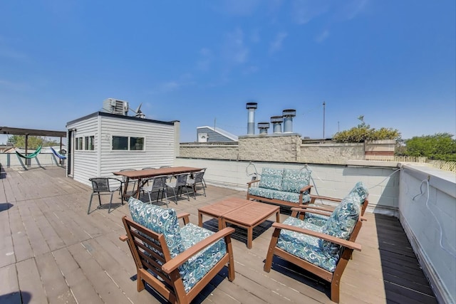1028 N Hermitage Ave Unit 3, Chicago, IL 60622 - wooden terrace with an outdoor hangout area and outdoor dining area