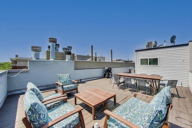1028 N Hermitage Ave Unit 3, Chicago, IL 60622 - wooden deck with outdoor dining area and outdoor lounge area