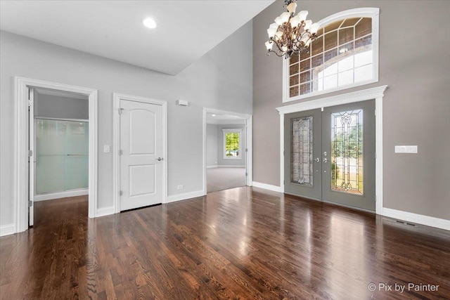 2814 Hapner Way, Batavia, IL 60510 - foyer entrance featuring a chandelier, wood finished floors, a high ceiling, and french doors
