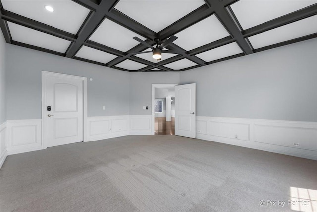 2814 Hapner Way, Batavia, IL 60510 - carpeted spare room featuring coffered ceiling, a decorative wall, beamed ceiling, wainscoting, and a ceiling fan