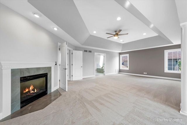 2814 Hapner Way, Batavia, IL 60510 - unfurnished living room with a raised ceiling, carpet floors, a ceiling fan, recessed lighting, and a premium fireplace