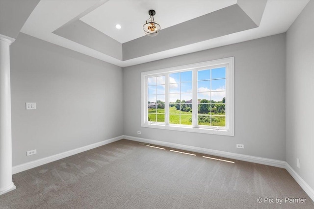 2814 Hapner Way, Batavia, IL 60510 - spare room with a raised ceiling, decorative columns, and carpet flooring