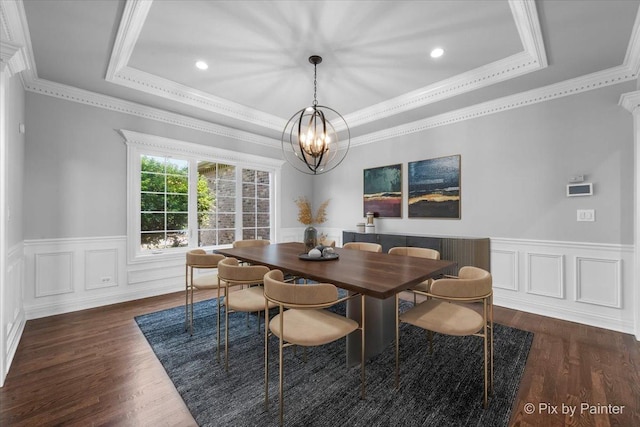 2814 Hapner Way, Batavia, IL 60510 - dining area featuring a tray ceiling, a chandelier, a wainscoted wall, wood finished floors, and crown molding