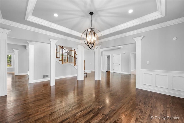 2814 Hapner Way, Batavia, IL 60510 - unfurnished living room featuring a chandelier, a raised ceiling, decorative columns, stairway, and ornamental molding