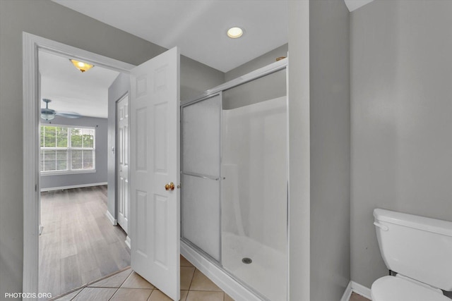 1697 Deer Pointe Dr, South Elgin, IL 60177 - bathroom with a shower stall, a ceiling fan, and tile patterned flooring
