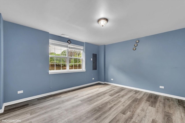 1697 Deer Pointe Dr, South Elgin, IL 60177 - empty room featuring wood finished floors and electric panel