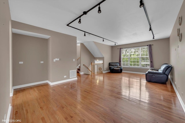 1697 Deer Pointe Dr, South Elgin, IL 60177 - unfurnished room featuring track lighting and light wood-style floors