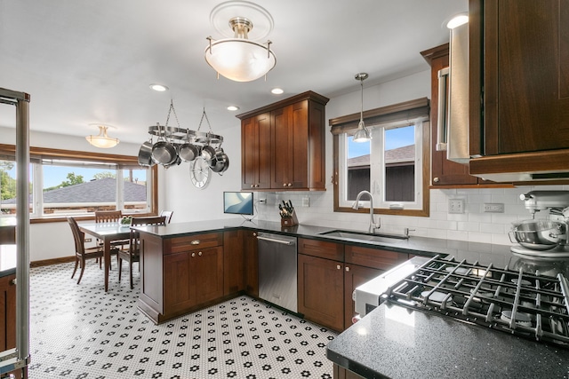 9429 S 55th Ave, Oak Lawn, IL 60453 - kitchen with dishwasher, a peninsula, healthy amount of natural light, decorative backsplash, and recessed lighting