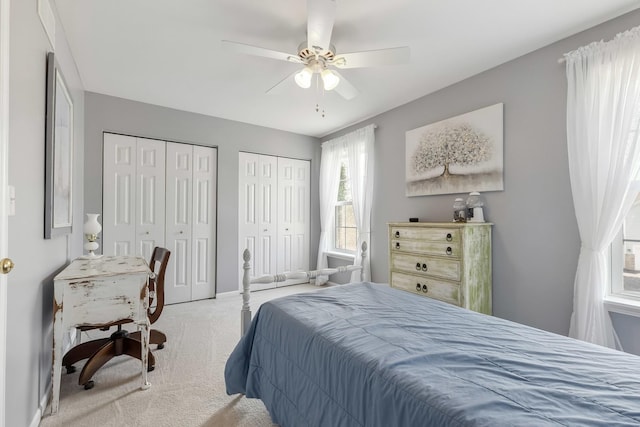 189 E Lark Ave, Cortland, IL 60112 - carpeted bedroom with two closets and ceiling fan