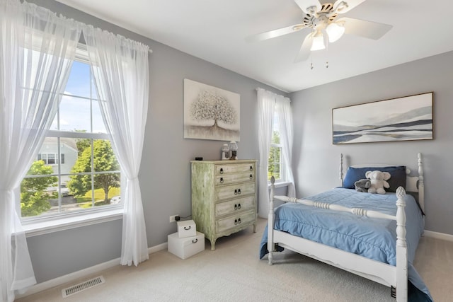189 E Lark Ave, Cortland, IL 60112 - bedroom featuring multiple windows, light carpet, and ceiling fan