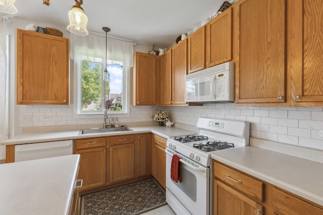 189 E Lark Ave, Cortland, IL 60112 - kitchen with white appliances, light countertops, tasteful backsplash, and pendant lighting