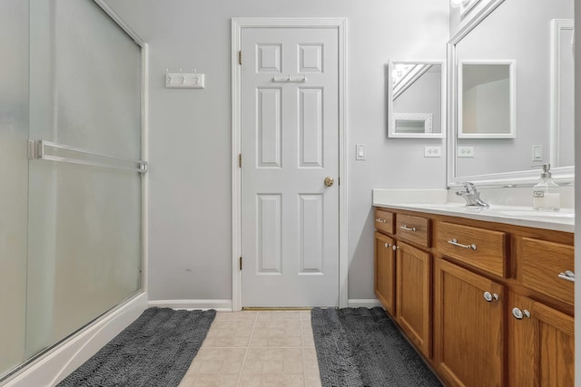 189 E Lark Ave, Cortland, IL 60112 - bathroom with vanity, a stall shower, and tile patterned flooring