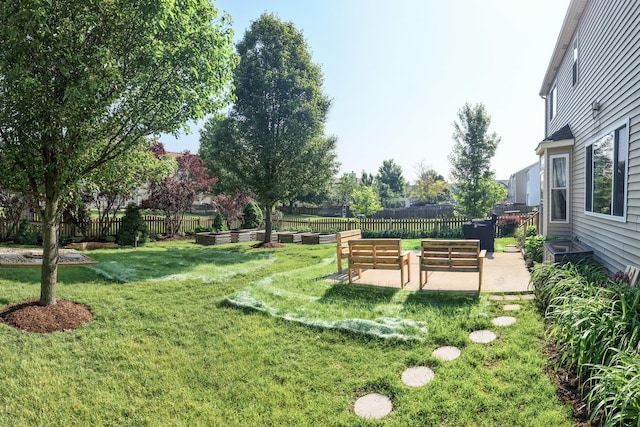 189 E Lark Ave, Cortland, IL 60112 - fenced backyard featuring a patio area and an outdoor hangout area