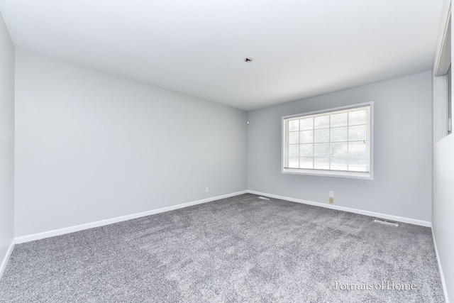 450 E Briarcliff Rd, Bolingbrook, IL 60440 - carpeted spare room featuring baseboards
