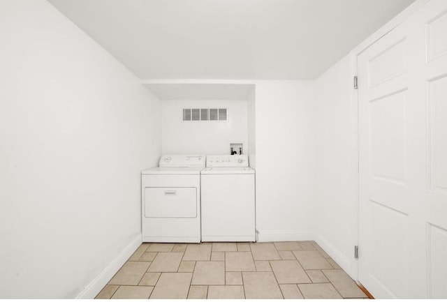 3617 W 63rd Pl, Chicago, IL 60629 - laundry area with washer and clothes dryer and light floors
