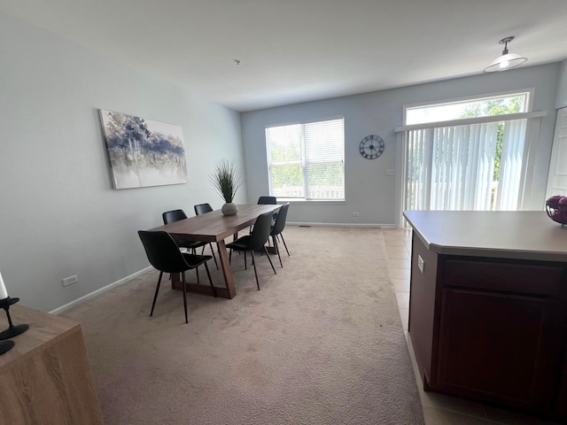 56 Veneto Ct, Streamwood, IL 60107 - dining space featuring light colored carpet
