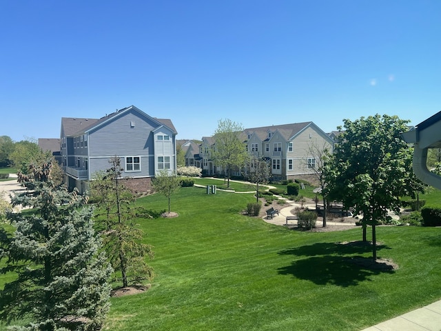 56 Veneto Ct, Streamwood, IL 60107 - view of green lawn featuring a residential view