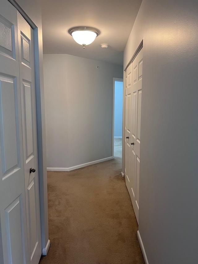 56 Veneto Ct, Streamwood, IL 60107 - hallway featuring dark carpet
