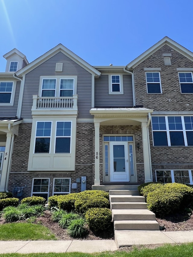 56 Veneto Ct, Streamwood, IL 60107 - townhome / multi-family property with brick siding