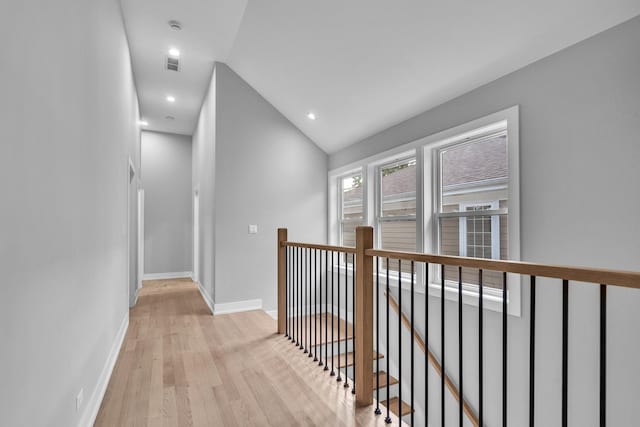 7635 W Balmoral Ave, Chicago, IL 60656 - corridor featuring an upstairs landing, light wood-style floors, lofted ceiling, and recessed lighting