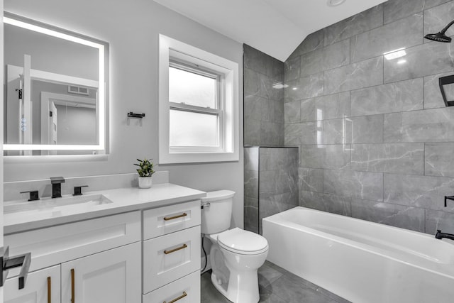 7635 W Balmoral Ave, Chicago, IL 60656 - full bath with vanity, shower / washtub combination, and vaulted ceiling
