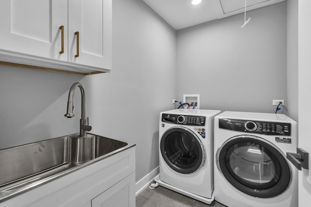 7635 W Balmoral Ave, Chicago, IL 60656 - laundry room with washer and clothes dryer, attic access, cabinet space, and recessed lighting